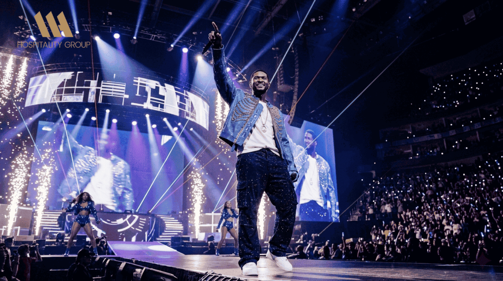 Usher performing live during Usher Tour 2026 with crowd energy